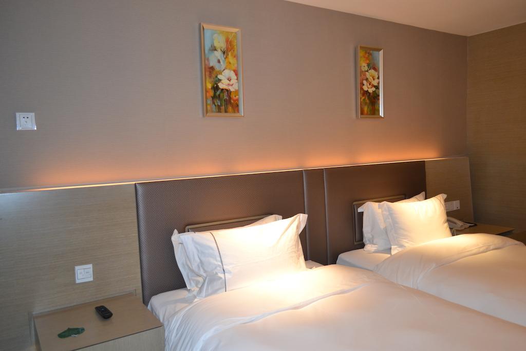 Angel Garden Hotel Hohhot Zimmer foto